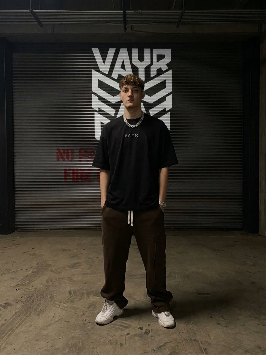 VAYR Urban Outfit - Void Black Oversized Tee paired with Dust Brown Wide-Leg Structured Pants